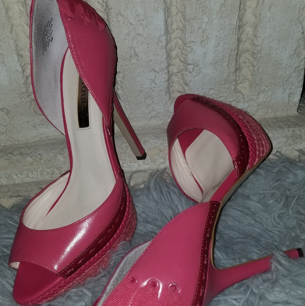 Pink peep toe pumps